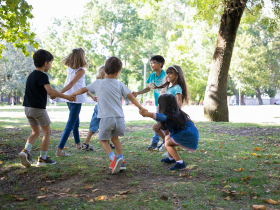 happy-children-playing-together-outdoors-dancing-around-grass-enjoying-outdoor-activities-having-fun-park-kids-party-friendship-concept.jpg